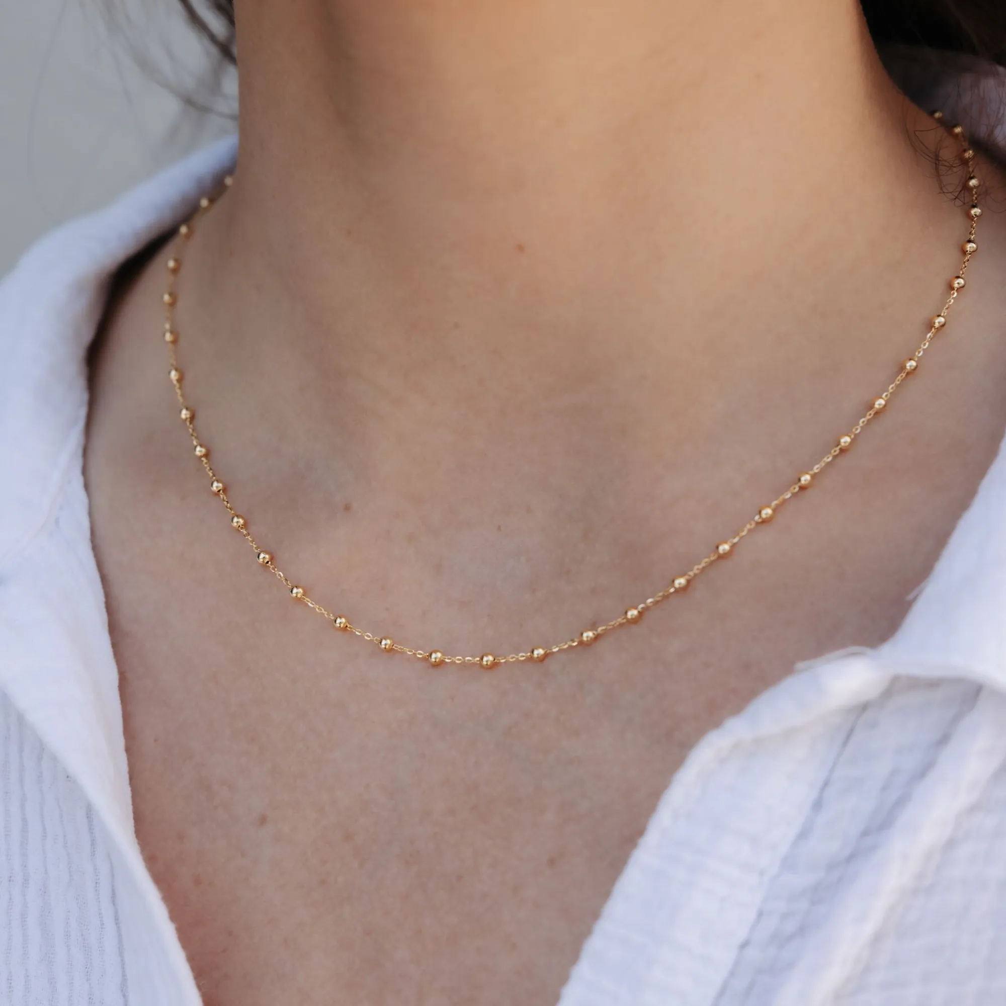 Gold Bead Station Necklace