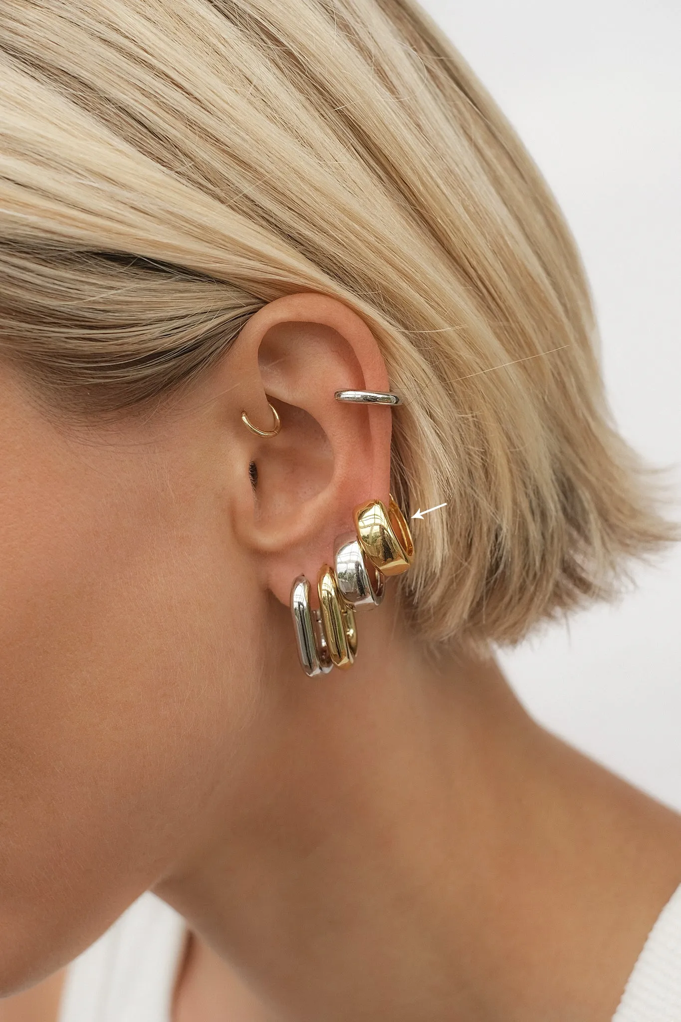 Luv Aj Monaco Wide Huggie Hoop Earrings in Polished Gold Plated