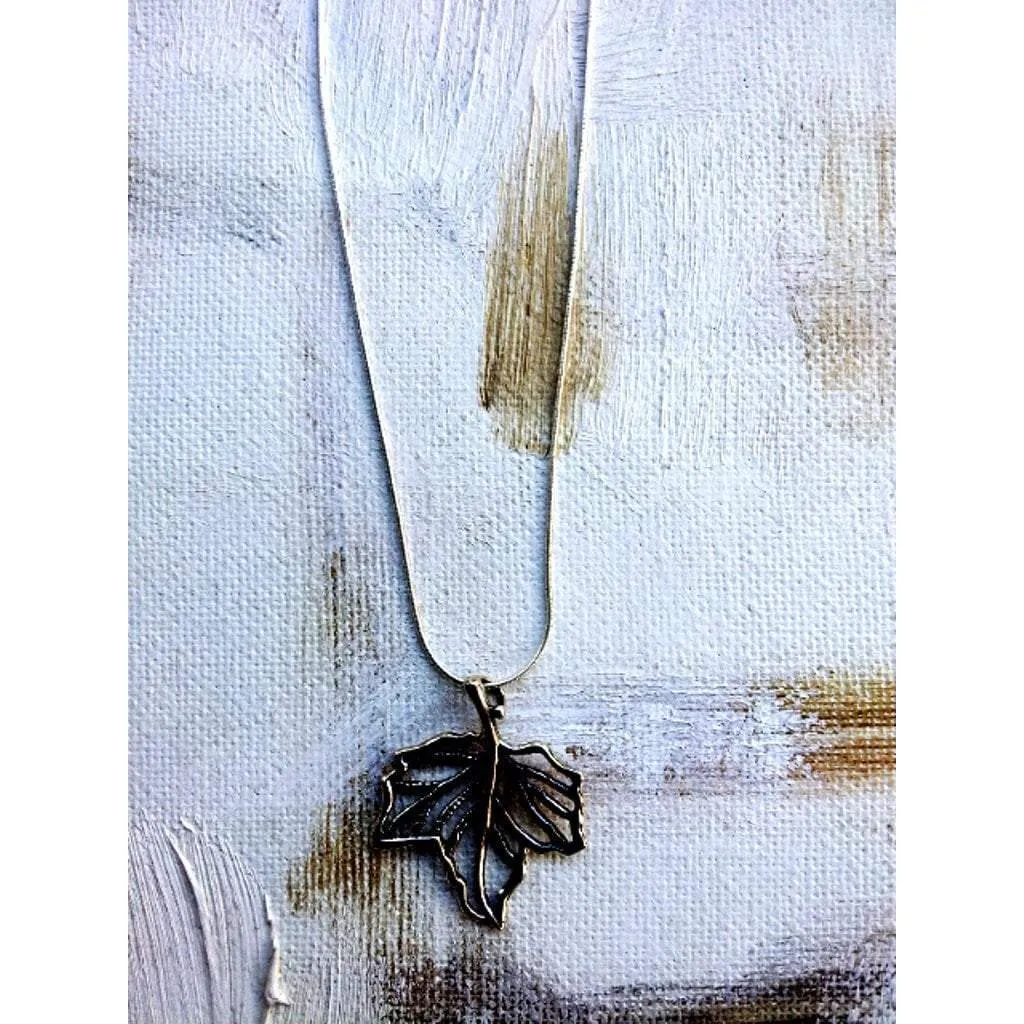 Sterling silver necklace with an Automn leaf motif pendant