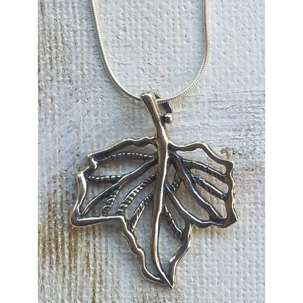 Sterling silver necklace with an Automn leaf motif pendant