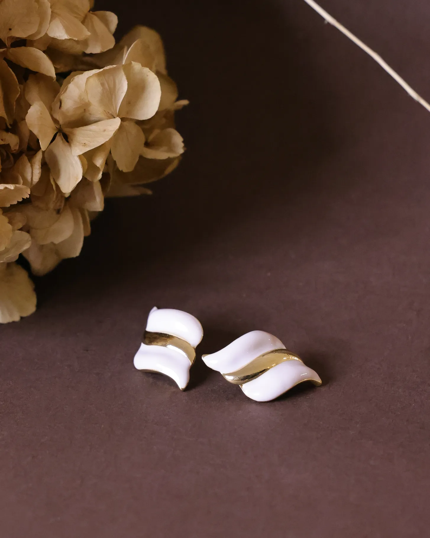 White diagonal stud earrings